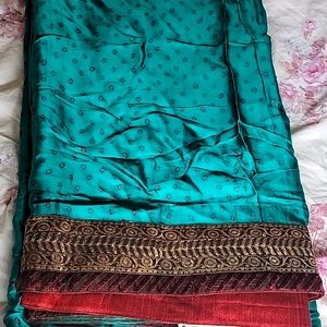 Satin saree with handmade bandhani.